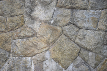background, old wall lined with stones