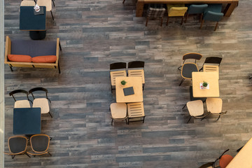 Top view on wooden tables  in cafe.