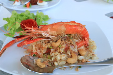 Close up the big orange shrimp on white plate