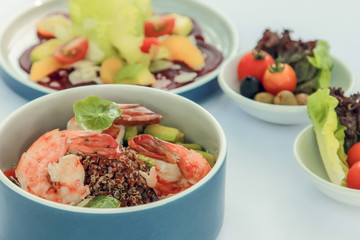 Tasty Fresh salad plate with shrimp tomato and mixed greens