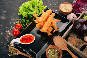 Grilled Shrimp. On a wooden background. Top view. Copy space for your text.