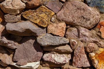 Colorful stones in desert for texture and white space