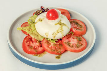 Delicious caprese salad with ripe tomatoes and mozzarella cheese Fresh italian caprese salad