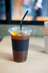 Ice americano with slice fresh orange