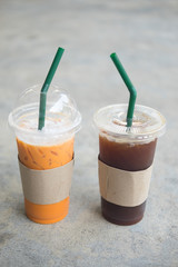 Thai tea and iced black coffee in plastic cup