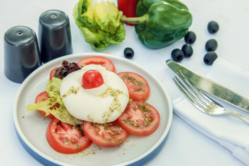 Delicious caprese salad with ripe tomatoes and mozzarella cheese Fresh italian caprese salad