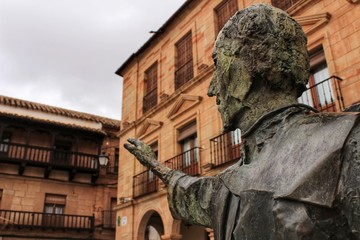 Villanueva de los Infantes square and Don Quixote statue in the foreground