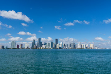 Fototapeta premium USA, Florida, Miami City skyline with waterfront and blue sky