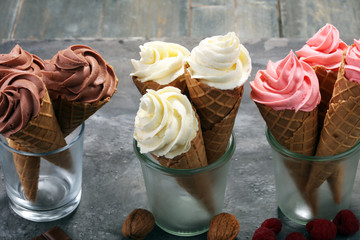 Vanilla frozen yogurt or soft ice cream in waffle cone