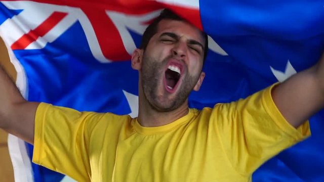 Australian fan celebrating with flag