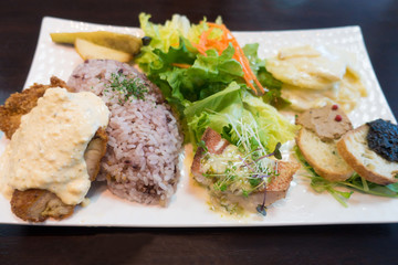 Set lunch with multi grain rice and varieties of dishes.