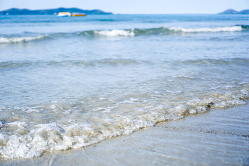 Sand and sea, concepts, leisure or travel.