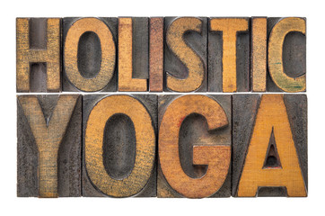 holistic yoga word abstract in wood type