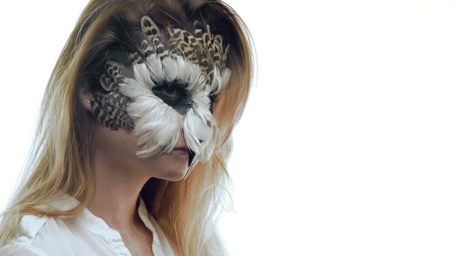 Close-up, Beautiful Girl with Owl Grimace Looks at the Side Then Turns Head
