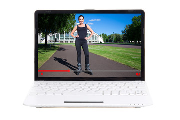 sport video blog concept - girl talking about rollerskating in video on laptop screen