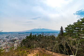 View of Mount Fuji at Fujiyoshida, Japan in the sunny day with cloud