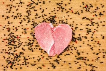 Raw meat in the shape of a heart.