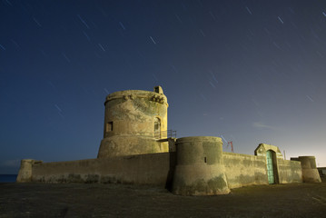 Fototapeta na wymiar Ancient fortress at night, Cabo de Gata, Almeria, Spain