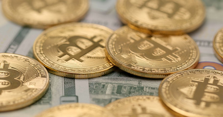 Pile of Bitcoin and USD