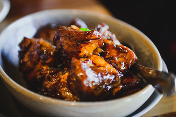 A burmese pork dish on a plate.