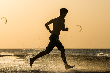 A man running on beach