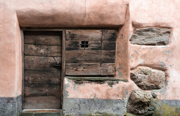 old wooden door in a stone house
