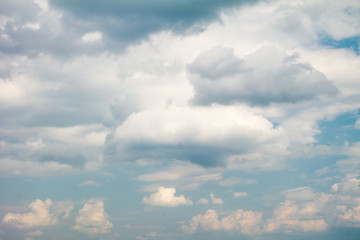 Naklejka na ściany i meble Blue sky with light cumulus clouds.