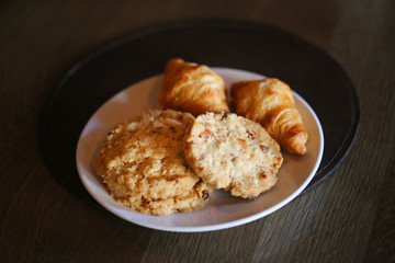 Photo of macro delicious croissants and cookies