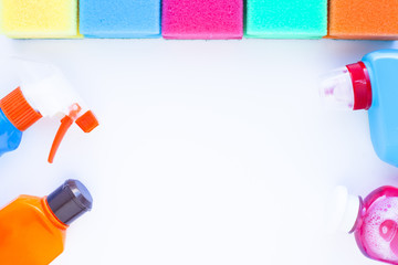 Set of colorful cleaning products isolated on white background. Cleaning service concept. Space for a text.