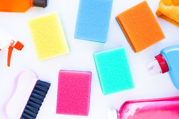 Set of colorful cleaning products isolated on white background. Cleaning service concept. Space for a text.