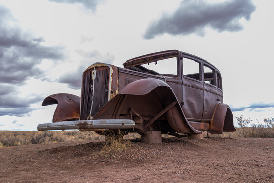 Old rusted out car carcass at the Petrified Forest National Park