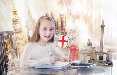 Pretty english girl with books, studying. English educational concept image with famous artefacts...