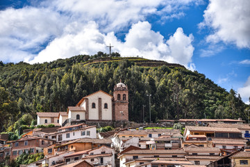 The Church of San Cristobal overlooks the city, in front of Cristo Blanco and the Inca site of Sacsayhuaman