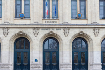 Fototapeta na wymiar Facade of Sorbonne University with France and European Union flags, Paris, France.