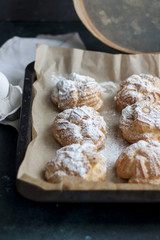 profiteroles against a dark background