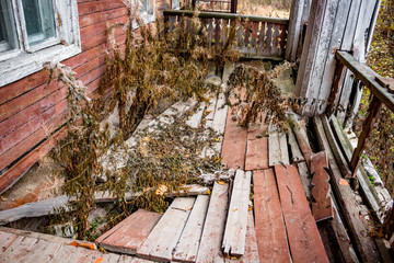 Rotten terrace old wooden house
