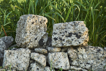 Old stones of a dry stone wall in Salento - Italy