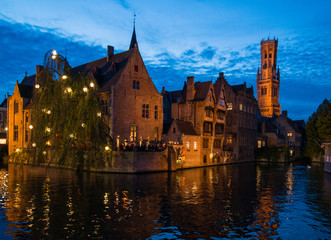 Fototapeta premium Brugge at dusk with reflection off the canal