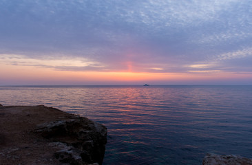 Clouds over sea, sunset over sea