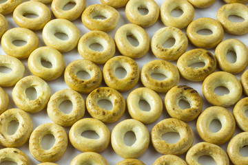Small bagels or small rolls on a white background.