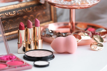 Fototapeta Decorative cosmetics on dressing table in makeup room obraz