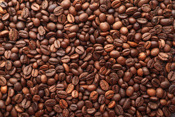 Coffee beans as background, top view