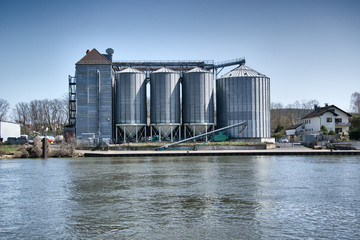 silos on the bank of the river main in bavaria