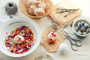Coloring Easter eggs. Chicken eggs, onion husks and other accessories.