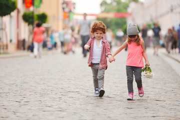 boy and girl walking on the street