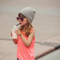 little hipster girl with coctail
