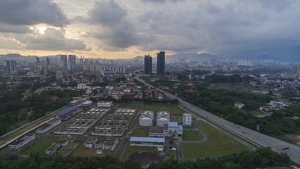 Naklejka na ściany i meble Aerial of a city's waste management sewage and water treatment plants