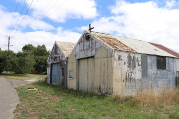 old rusty corrugated iron sheds in rural Australia