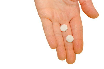 an isolated human palm with pills, to give the patient as a cure