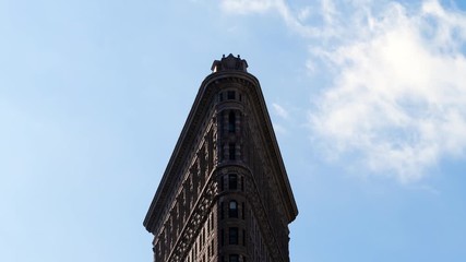 Time lapse of clouds moving by the Flatiron Building in New York City.